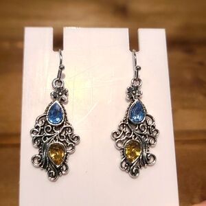 Earrings Silvertone dangle scrolling into light blue & amber rhinestones NWT